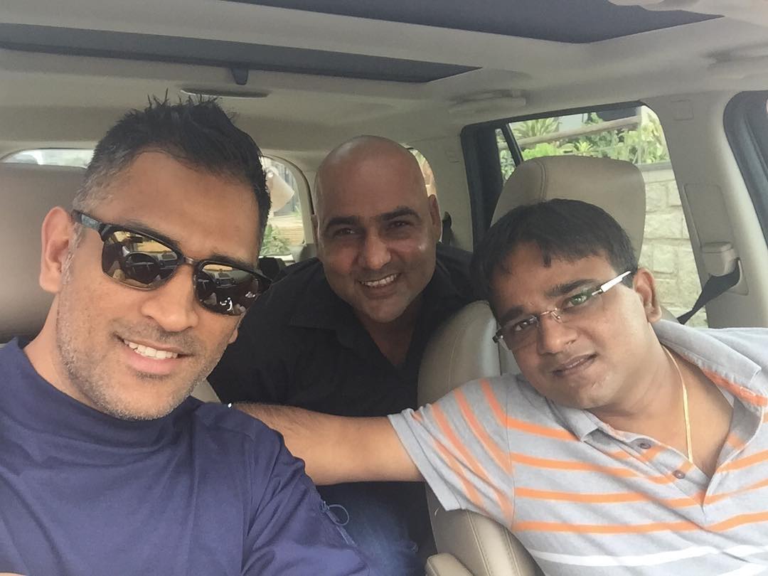 MS Dhoni Three stooges going for a drive Wallpaper
