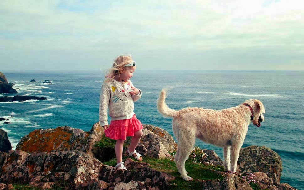 Girl-Dog-On-Sea-Image