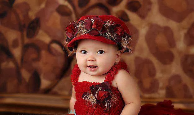 Lovely Baby Girl In Red Dressing