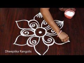 simple and easy freehand flower rangoli design * new kolam designs * easy rangoli designs