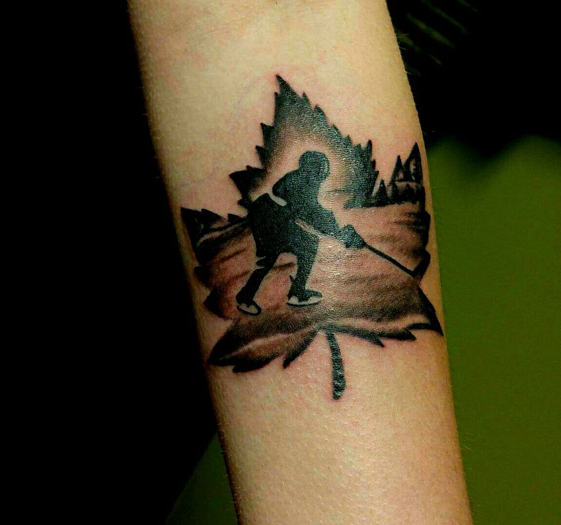 The most Canadian maple leaf hockey tattoo